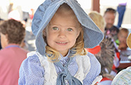 Girl dressed as a pioneer