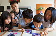 Family looking at pictures