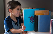 boy looking at books