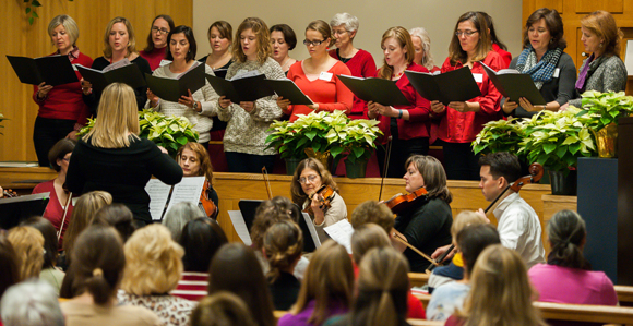 Local community Christmas choir performing a musical program