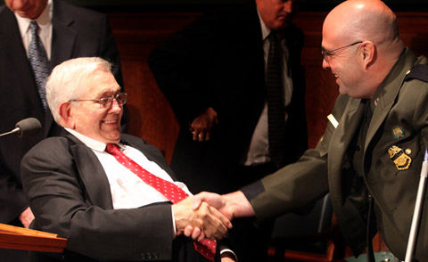 President Packer shaking hands