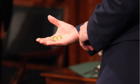 Chaplain presents coin