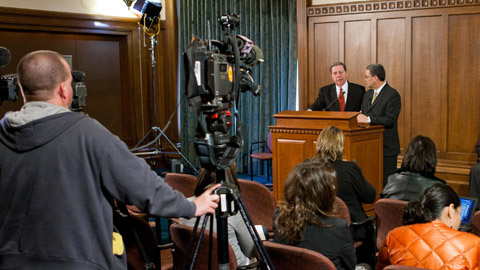 Elder Holland and Elder Evans at News conference