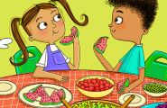 Boy and girl eating a healthy meal.