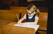 Young girl writing