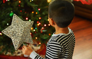 Young boy holding a star