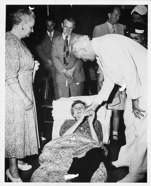 President Mckay holding a sister