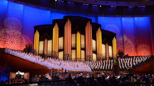 In these images we can see the full Mormon Tabernacle Choir with the organ pipes behind them, the design and decor around them and the Orchestra on Temple Square below. This is a wide shot. 

This was for the concert on July 14-15, 2017 at Conference Center in Salt Lake City, Utah

2017 Mormon Tabernacle Choir and Orchestra on Temple Square Pioneer Day Concert