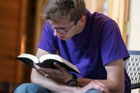 student reading the scriptures