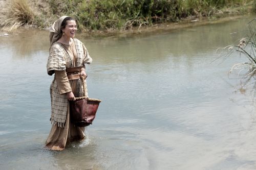 woman gathering water