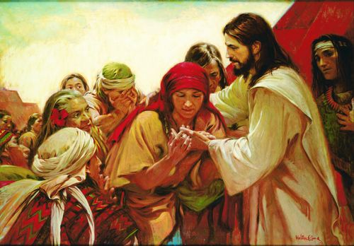 a woman looking at the hand of the resurrected Savior