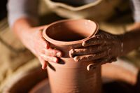 clay pot being made by potter