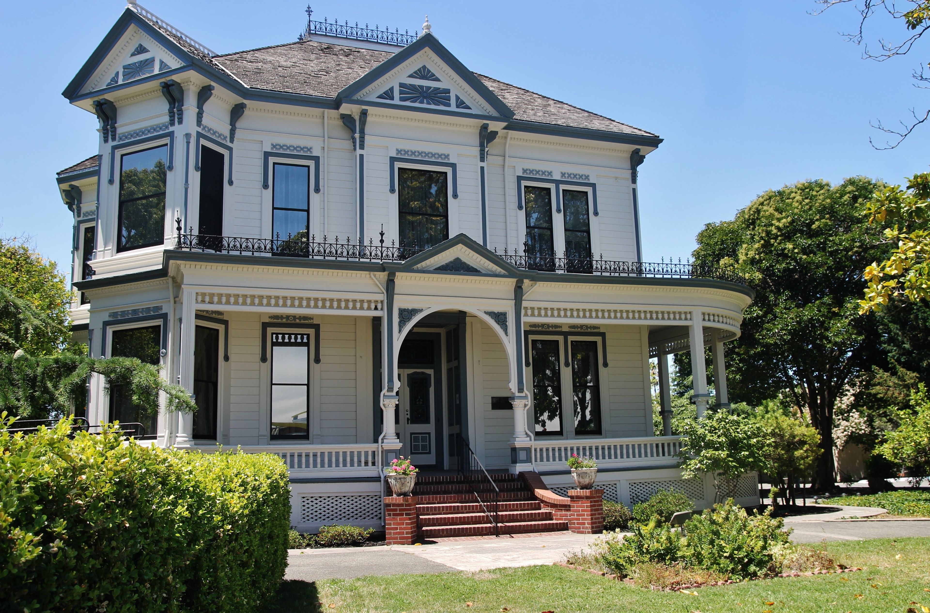 A white Victorian-style home.