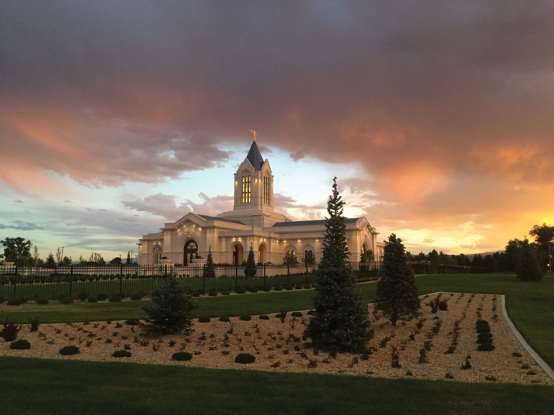 An exterior view of the Fort Collins Colorado Temple at sunset.
