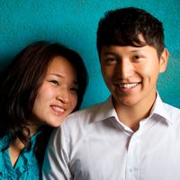 Young couple sitting together.