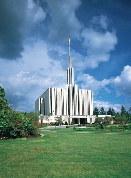 The Seattle Washington Temple, with a view of the spire, entrance, and grounds.