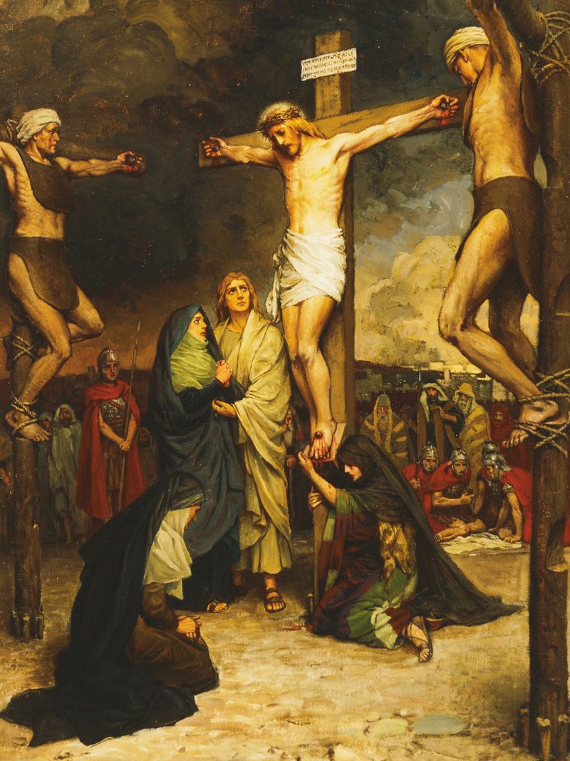 Jesucristo cuelga en la cruz entre dos ladrones