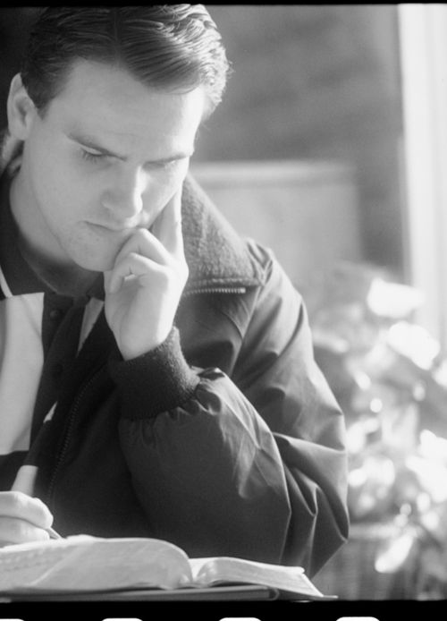 man studying scriptures