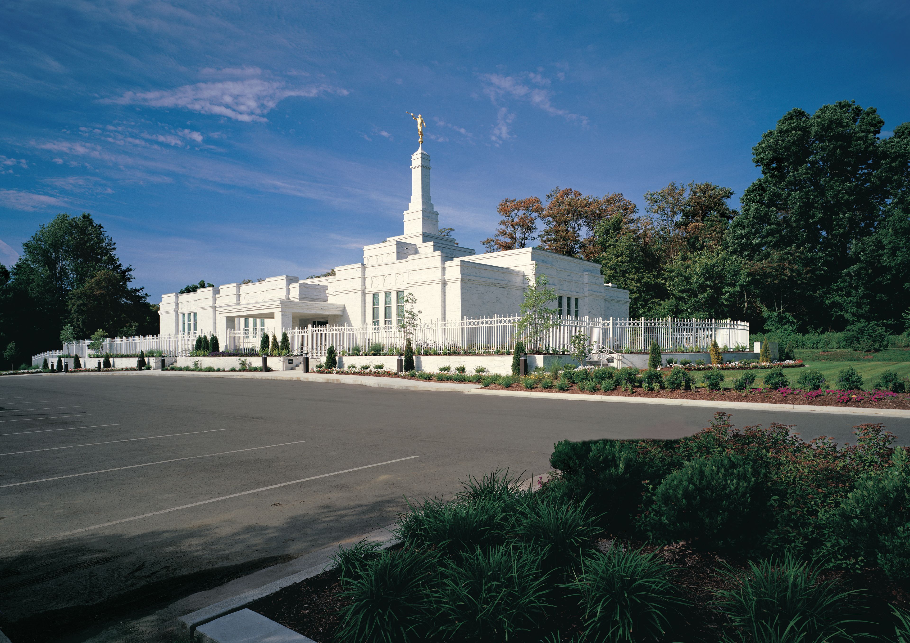The Louisville Kentucky Temple and its parking lot on a sunny day.