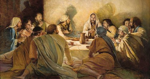 Christ and eleven apostles seated on the floor around a low table