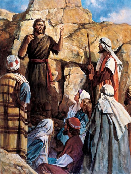 Jean-Baptiste prêche à un groupe de gens