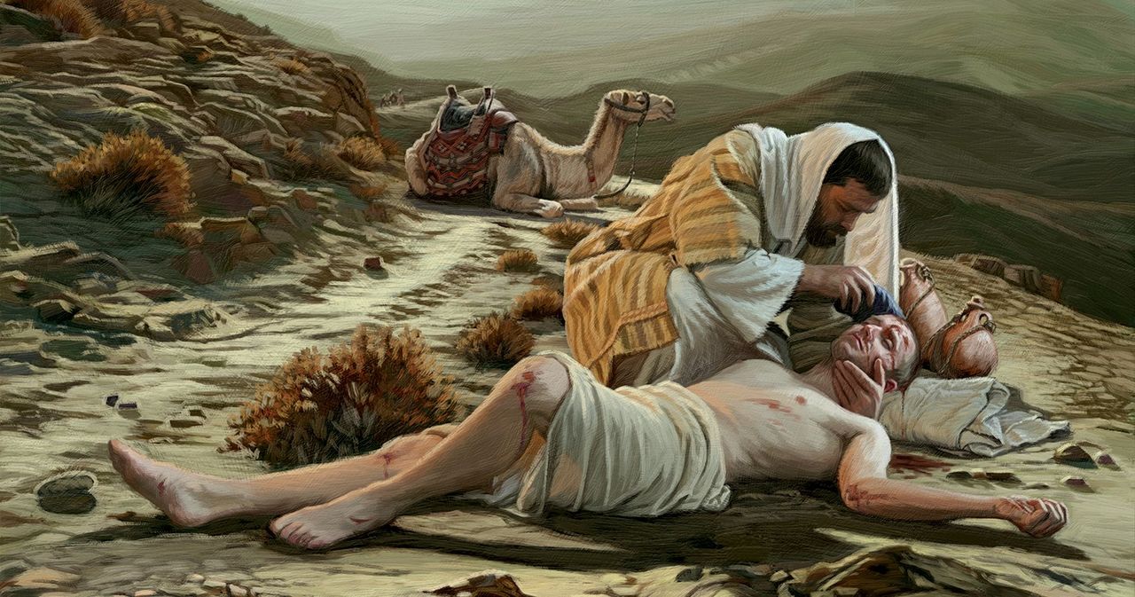 The good Samaritan helping a wounded man on the road.