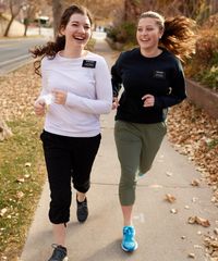 Sister missionaries model appropriate dress and attire. They are wearing approved clothing for physical activity.