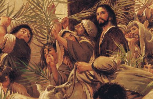 Jesus Cristo montado em um jumento e as pessoas acenando com ramos de palmeira