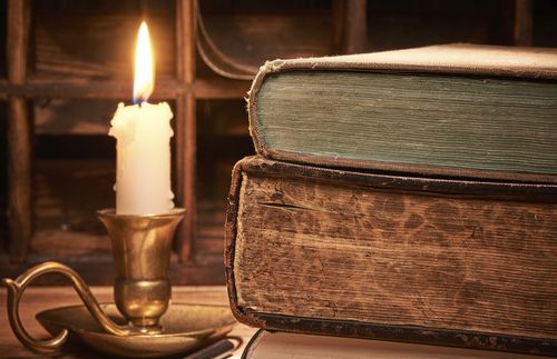 candle and books