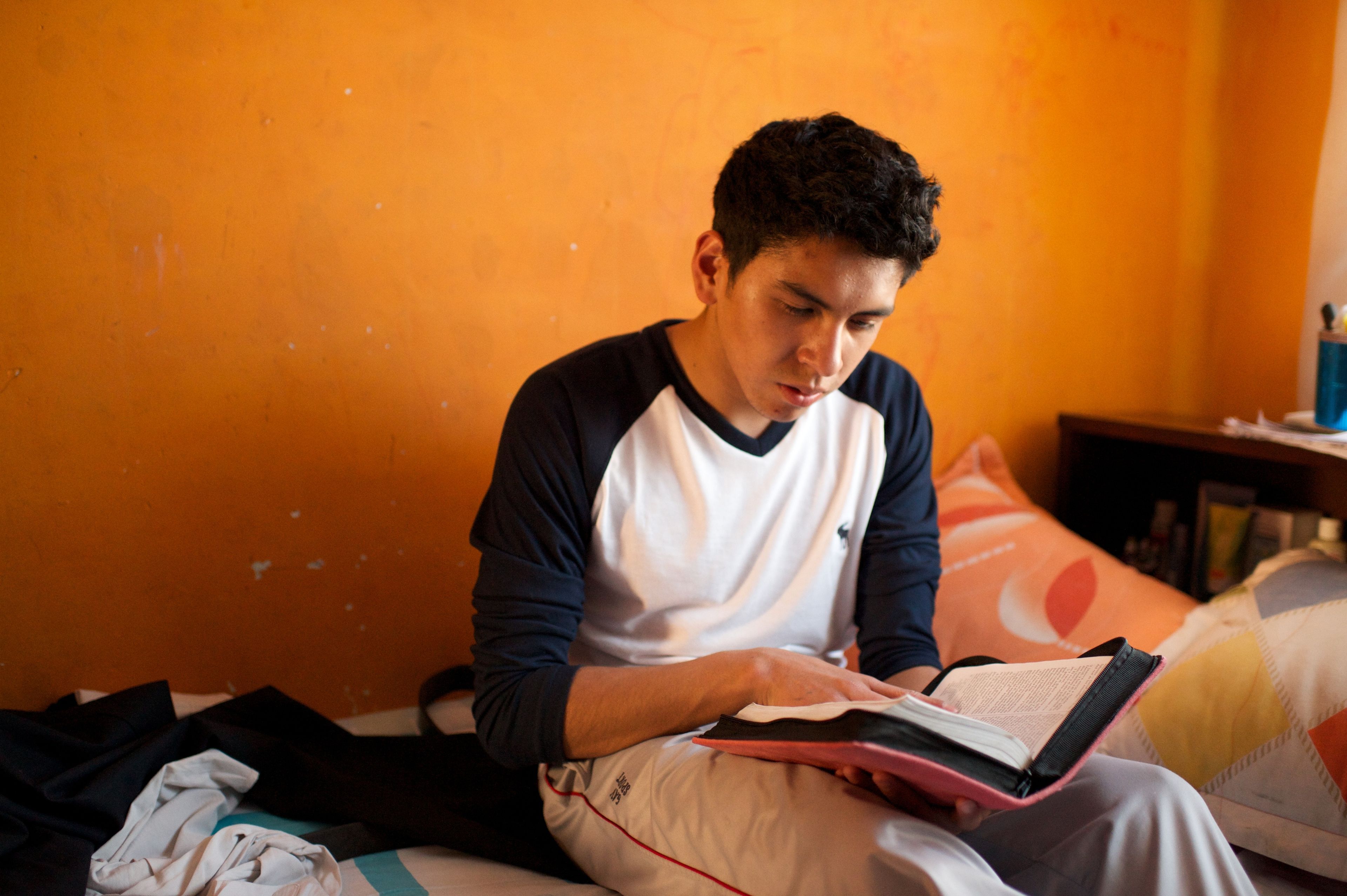 A young man studying in Bolivia.