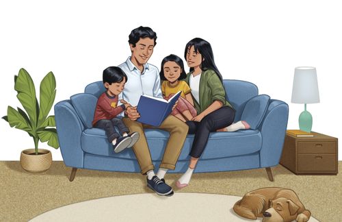 A family reading together on a couch