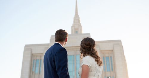 Young couple stands outside the Ogden Utah Temple