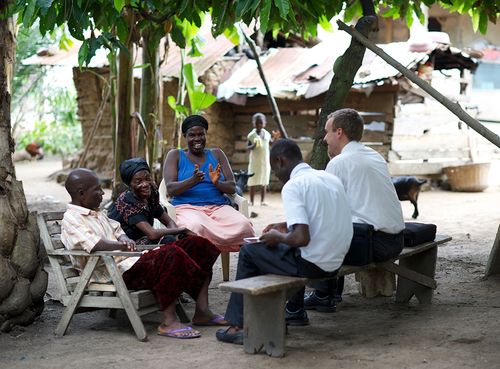 missionaries teaching a family