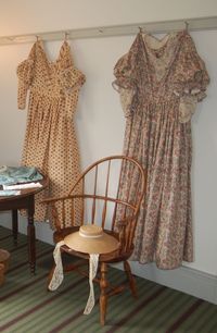 Interior of Hyde Home--dresses hanging on wall
