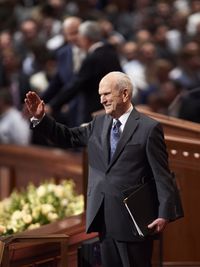 President Russell M. Nelson waving to audience at 2018 April General Conference.