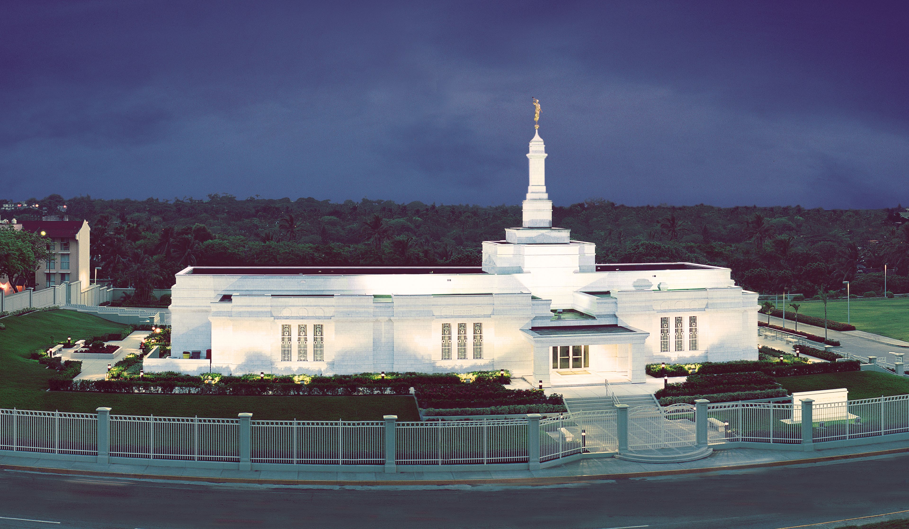 The Veracruz Mexico Temple in the evening, including the entrance and scenery.