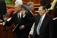 Henry B. Eyring and Thomas S. Monson wave to the crowds at the October 2010 General Conference.