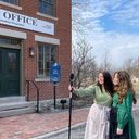 Sister missionaries giving virtual tour in Nauvoo on Main Street