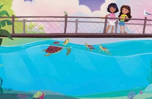 Girls standing on bridge looking at sea turtless in the water below