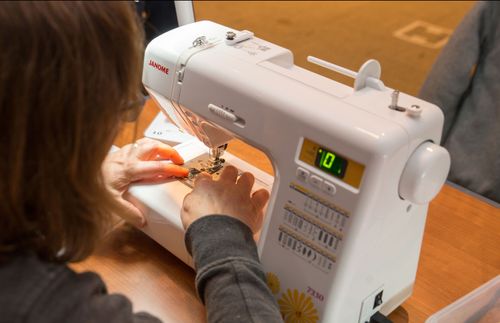 a woman at a sewing machine