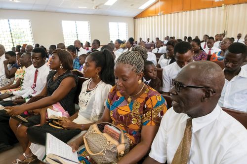 Members singing in a Church meetinghouse in Ghana, Africa.
