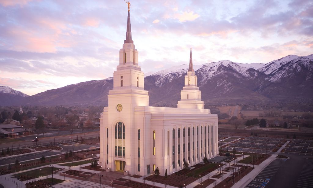 Exterior image of the Layton Utah Temple. The image features the architecture of the temple taken in the evening. 