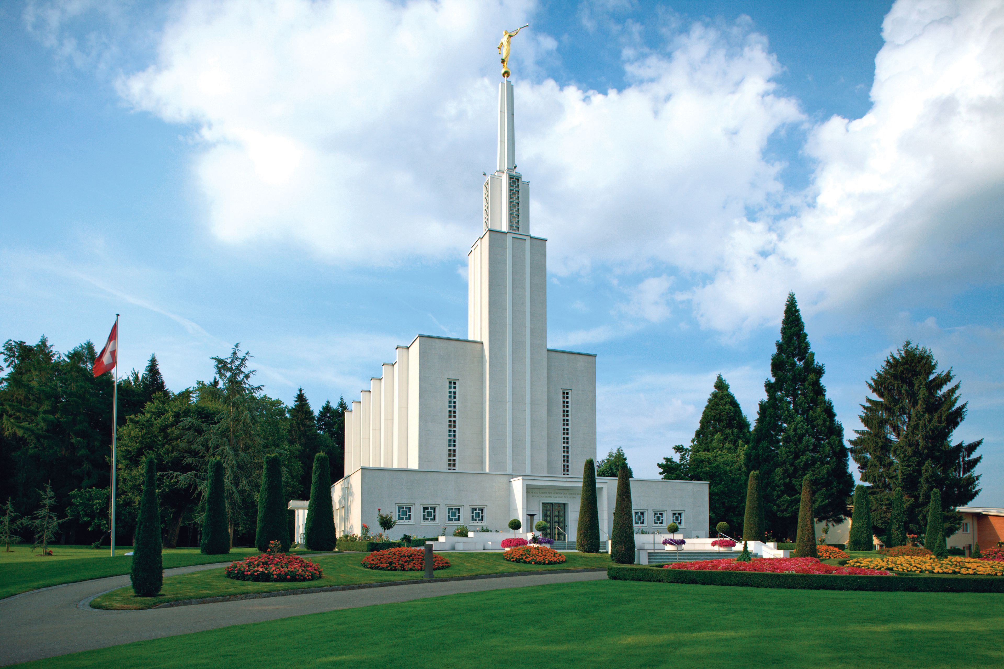 An exterior view of the Bern Switzerland Temple and grounds during the spring.