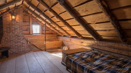 Photograph of the loft bedroom of the reconstructed home of the Joseph Smith Sr. family