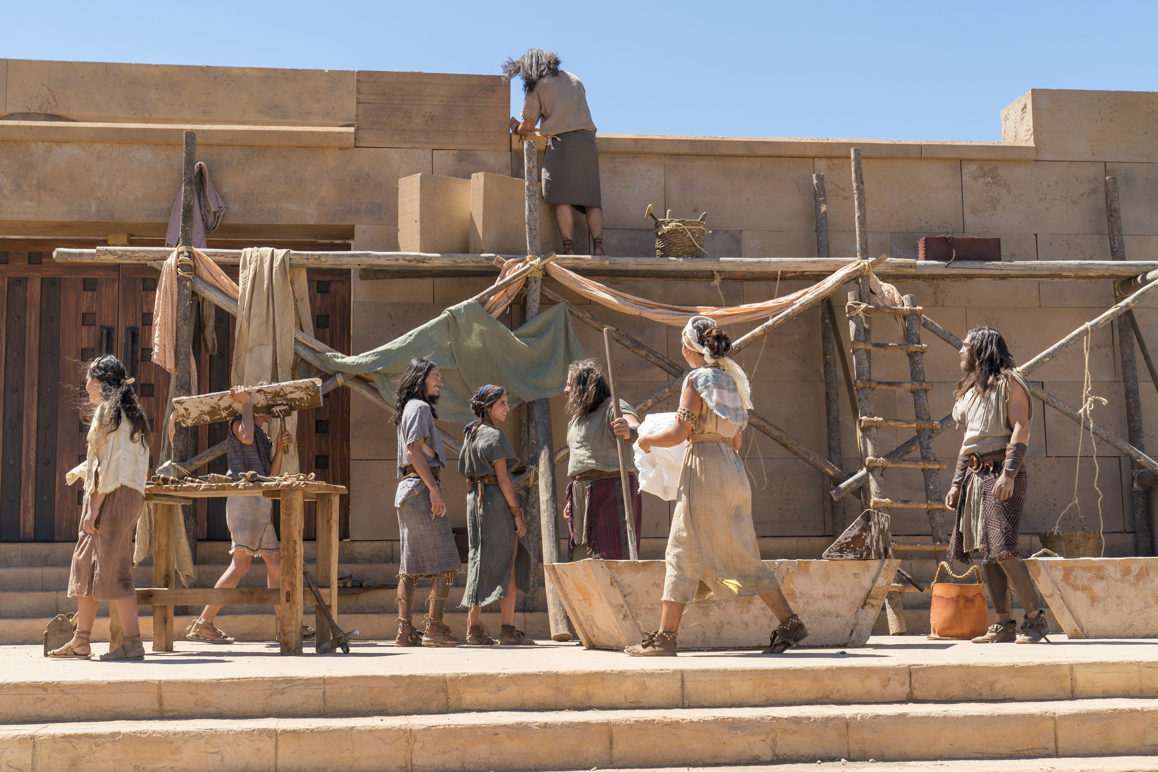 Nephites work on the temple in the Land of Nephi.