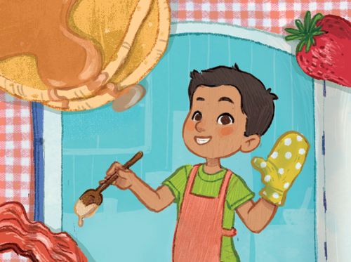 Boy with oven mitt and apron