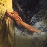 Photographic illustration of the hands of Jesus Christ grasping the hands of the apostle Peter as Christ saves Peter while walking on the Sea of Galilee.