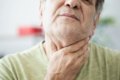 Man with sore throat