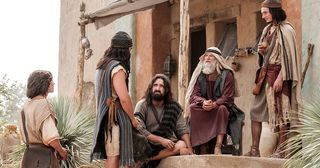 Nephi and his brothers talking with Ishmael
