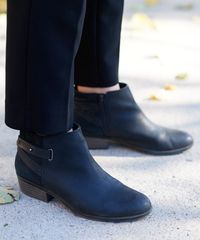 Various sister missionaries model appropriate footwear. They wear correct and approved clothing along with the shoes. These are dress shoes.